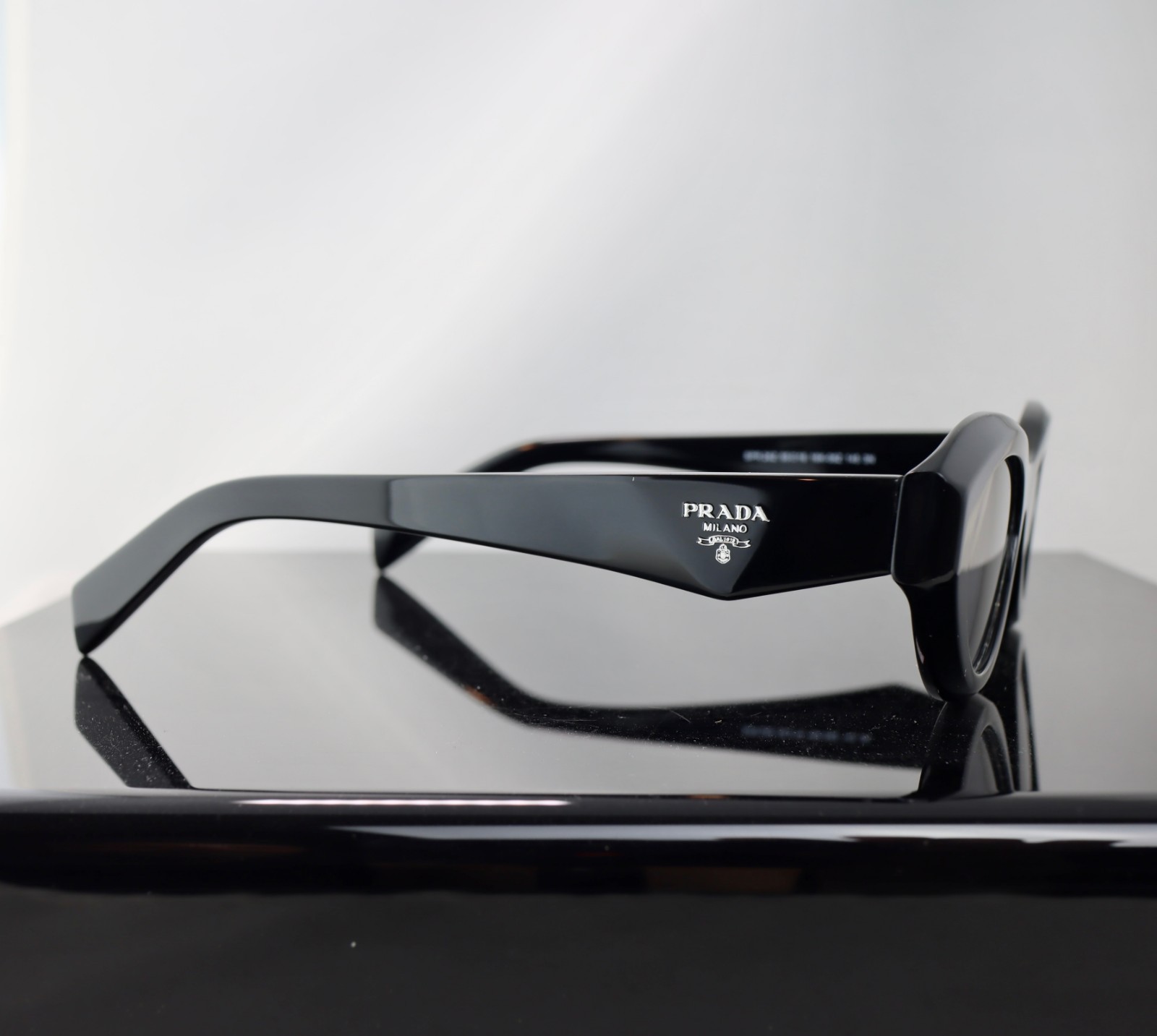 Prada PR26ZS Black / Gray Lens Oval Sunglasses 100% UV