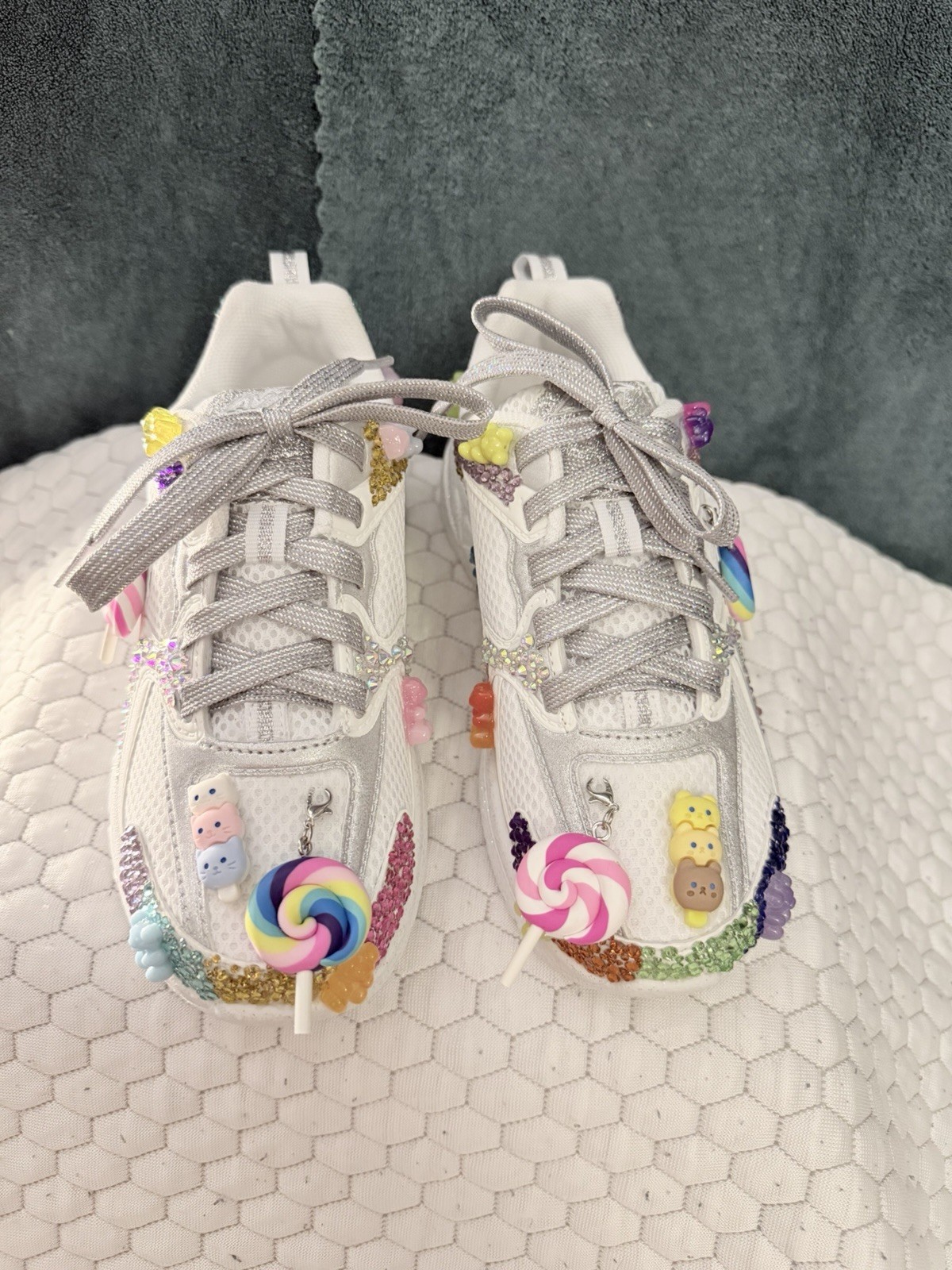 Hand-customized white Avia sneakers with silver laces. Shoe size is 1.