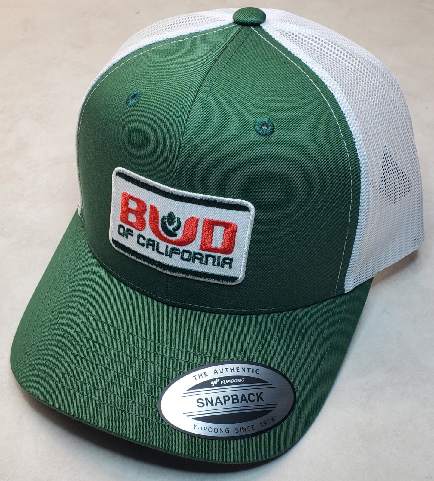 Bud of Calif Patch on Yupoong 6606 Classics Trucker Hat Snapback Evergreen/White