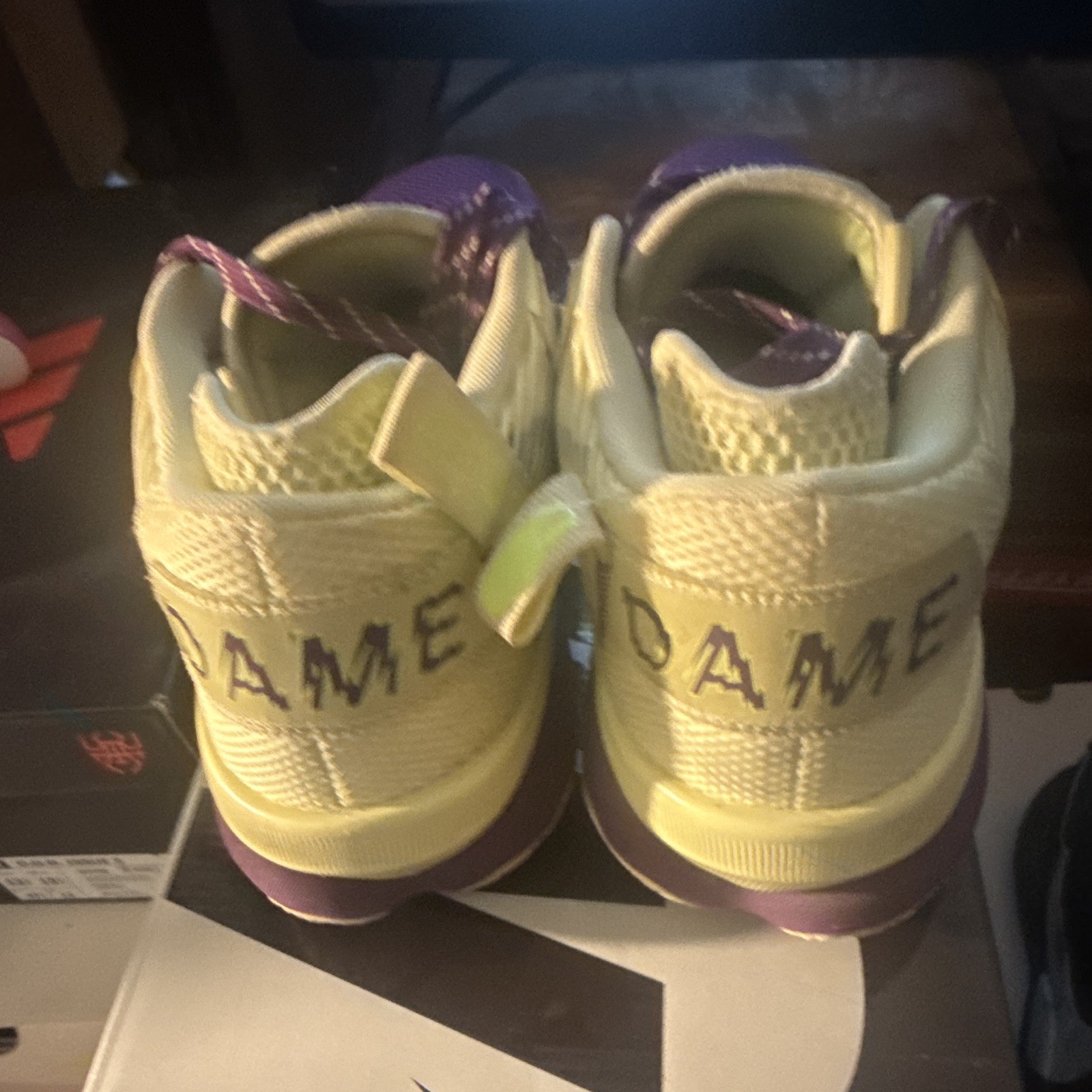 adidas Dame Men’s Mid Top Lace-Up Basketball Sneaker Colorblock Purple/Yellow