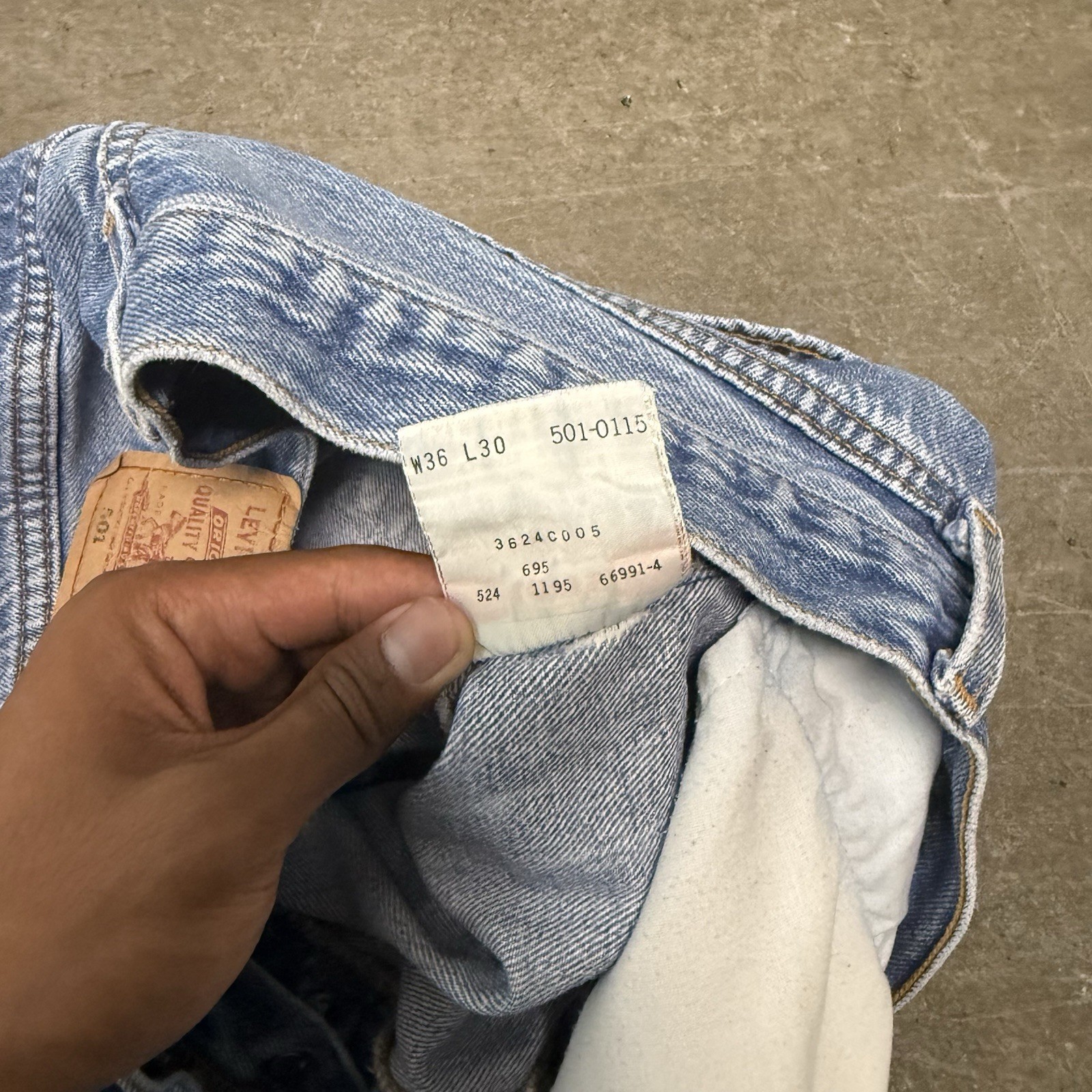 VINTAGE 90s Levi’s 501 Series button fly light wash straight jeans distressed