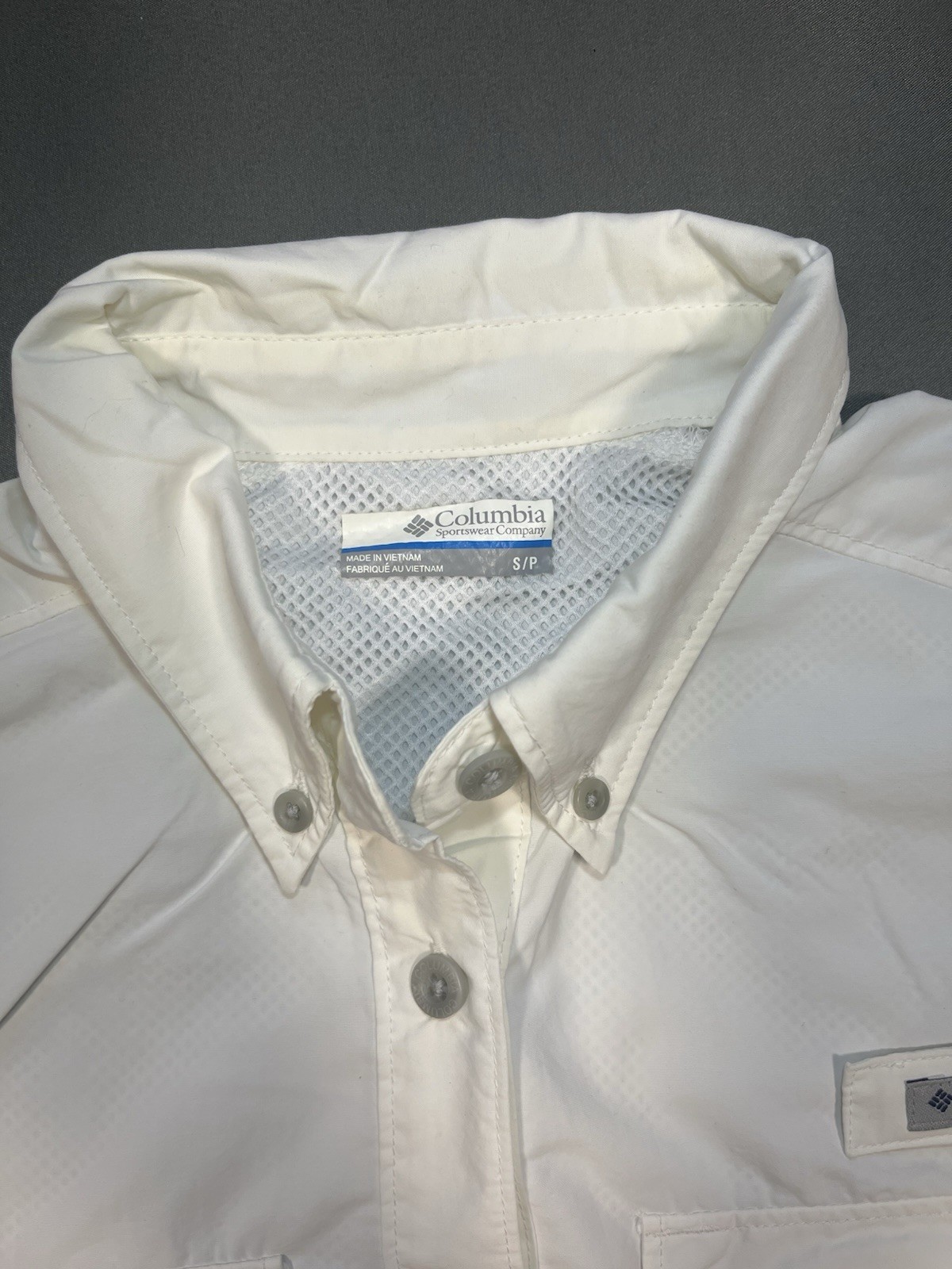 White Columbia PFG Bahama II and features two chest pockets with Utility Loops