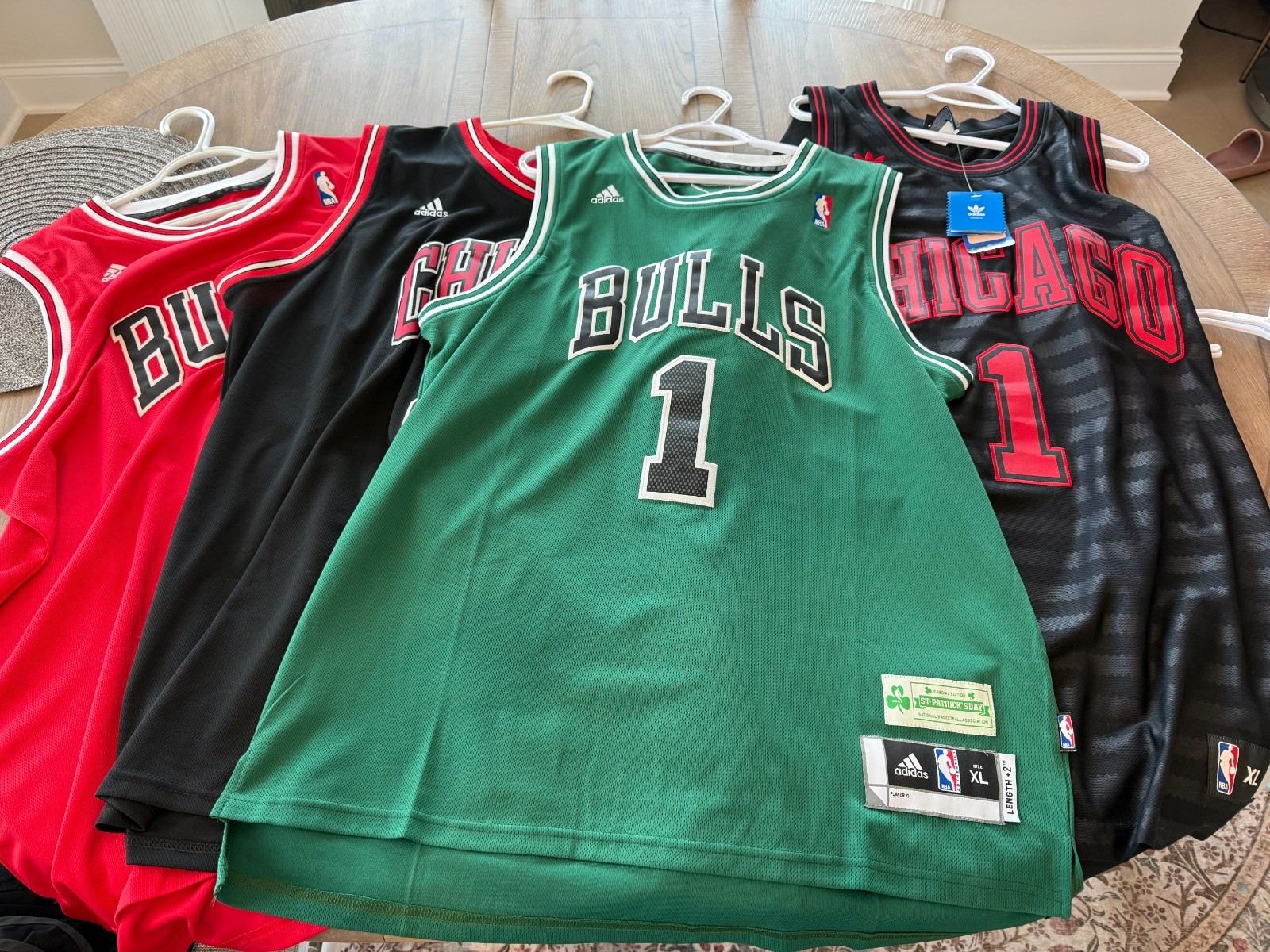 4 Bulls Basketball Jerseys Sz XL-3 used and 1 NWT