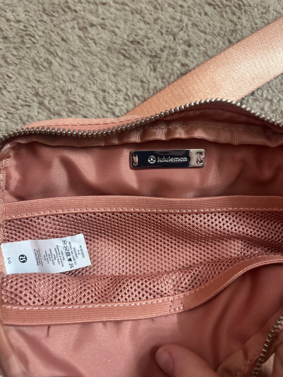 lululemon fanny pack, coral pink color, barely used, shiny logos