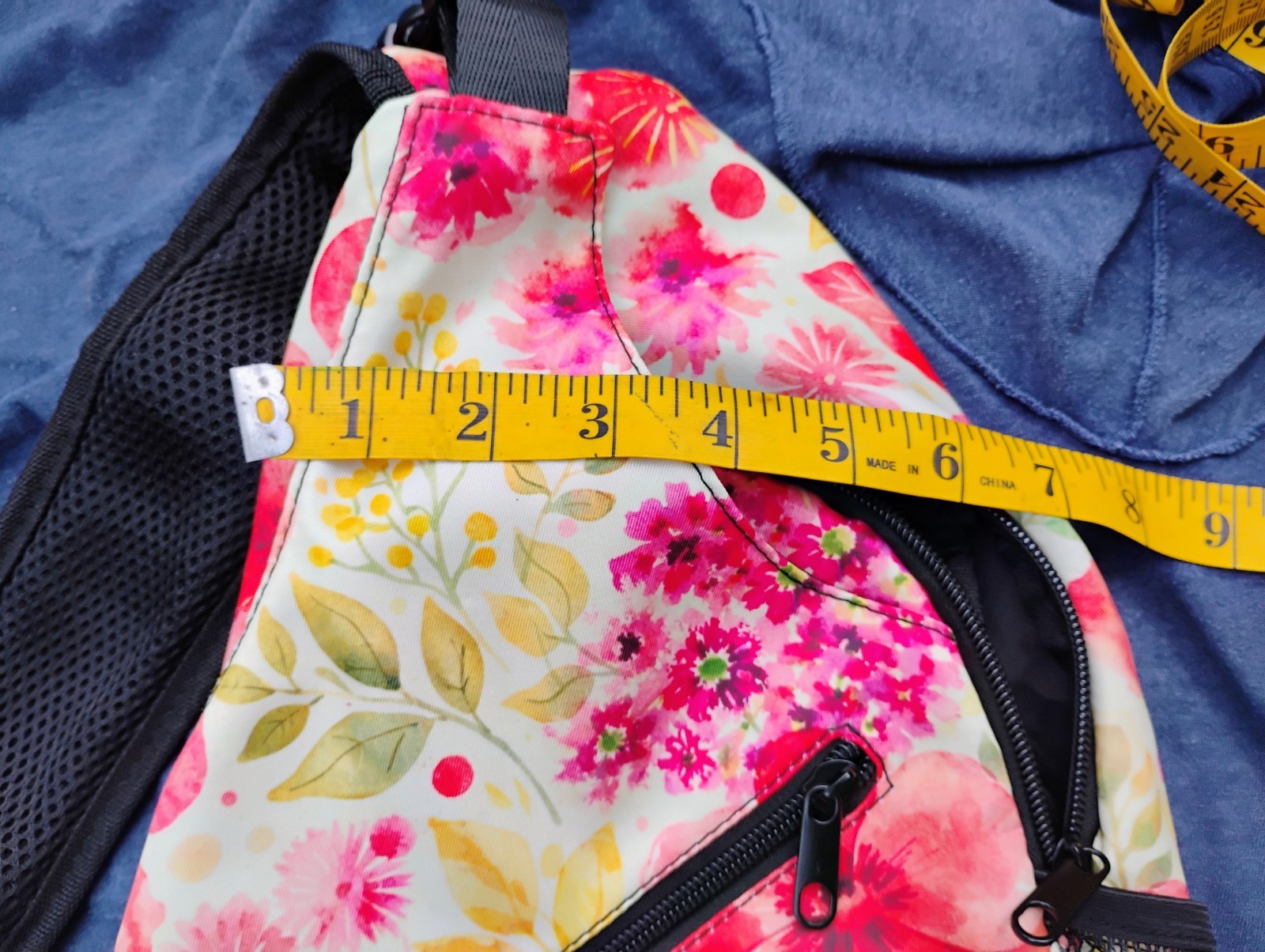Cross body backpack sling with floral print adjustable strap
