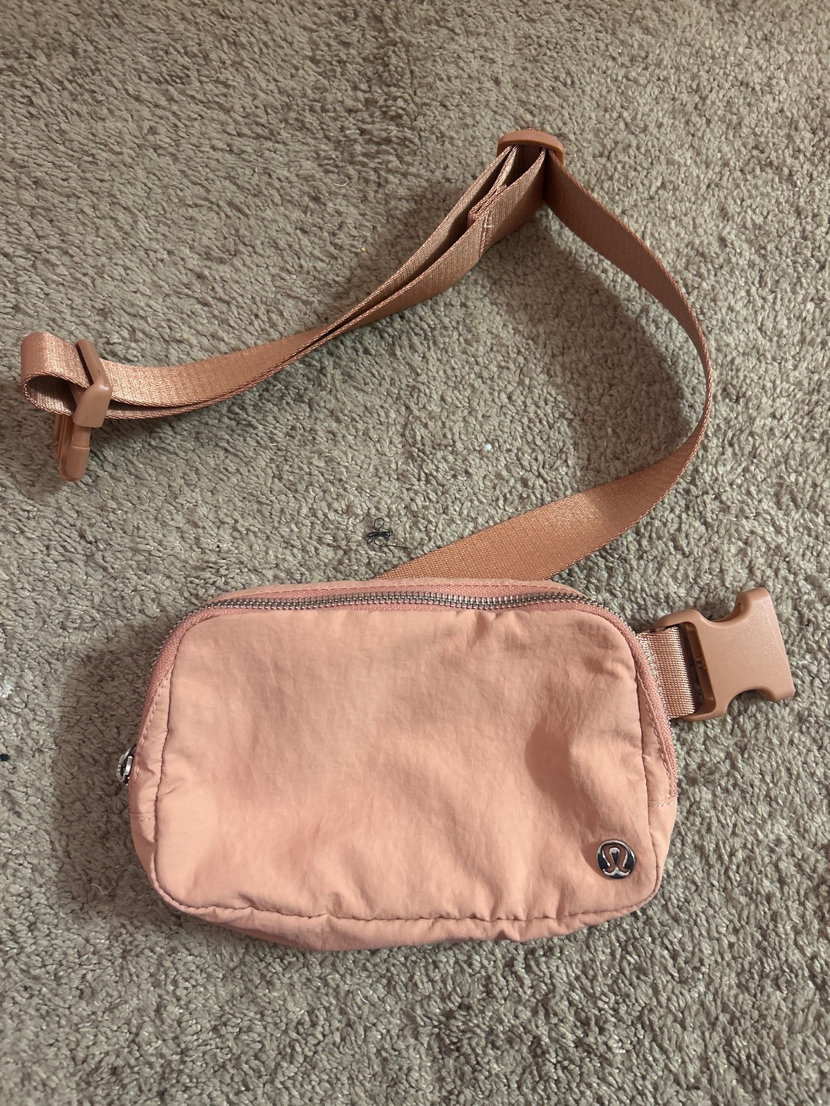 lululemon fanny pack, coral pink color, barely used, shiny logos