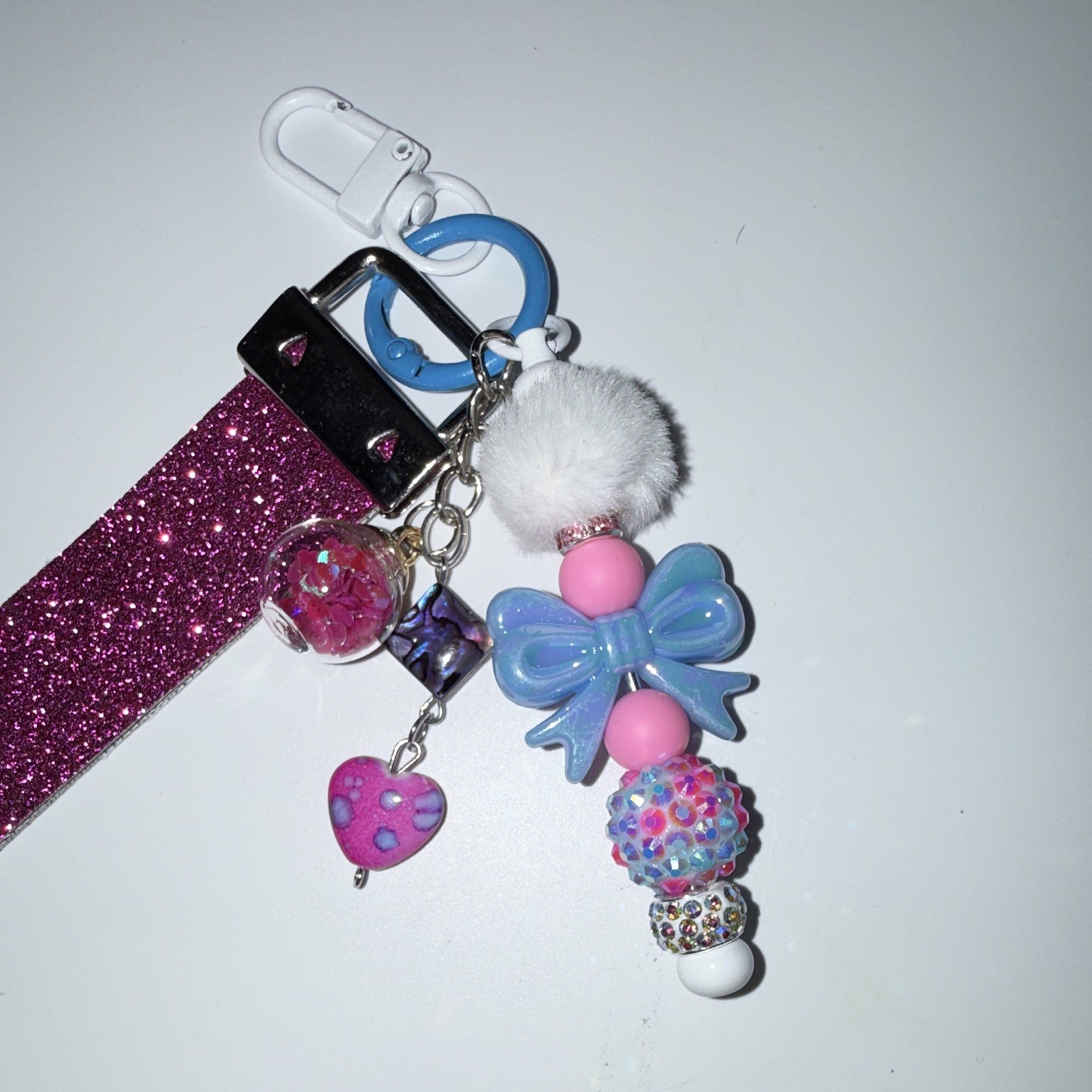 Pink Glitter Wristlet Strap Key Chain/Bag Charm w/Blue Bow Heart Beads Pom Pom