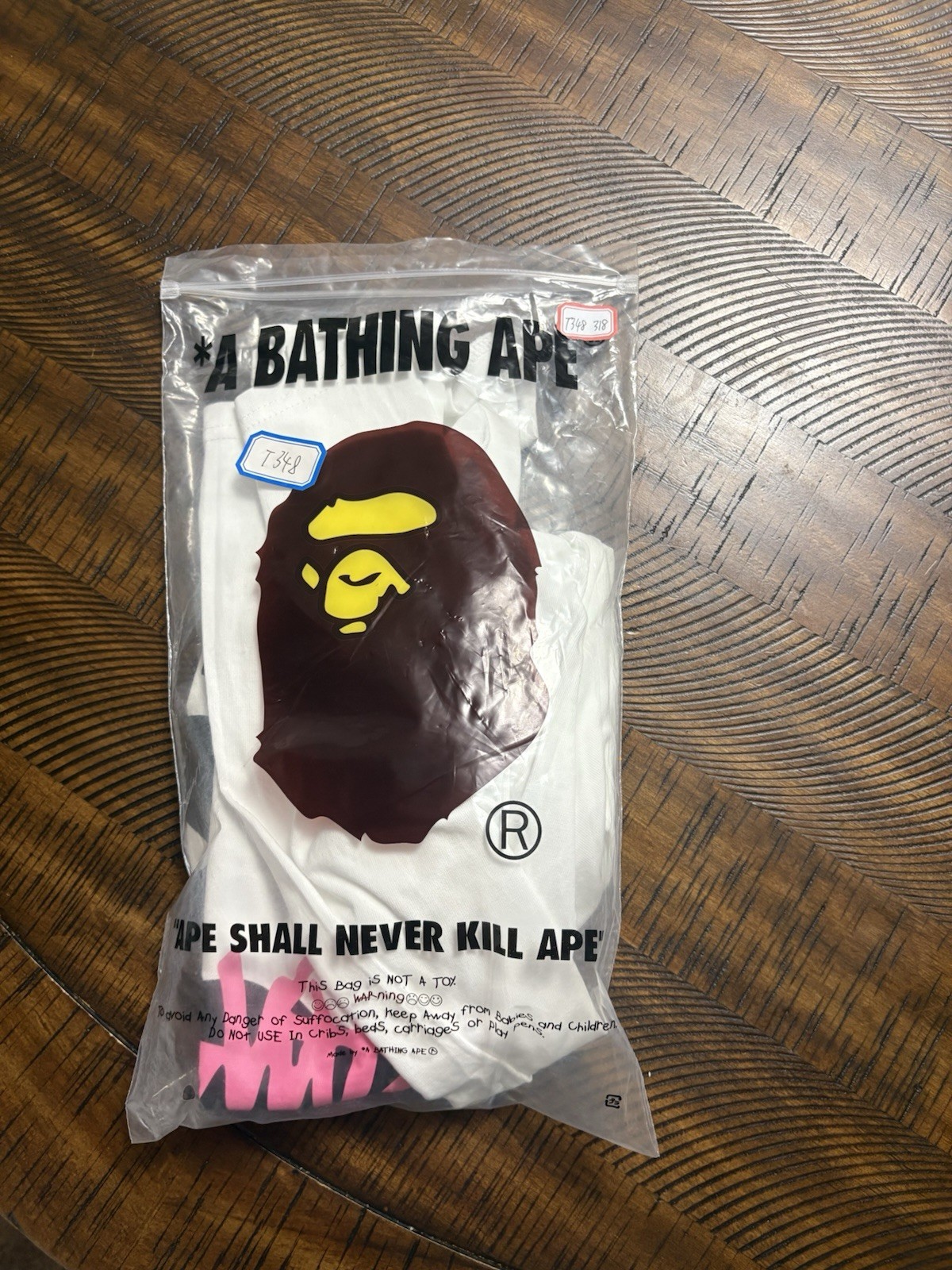 A Bathing Ape (BAPE) x Stussy Men’s L White Ape Head Graphic Tee Crew